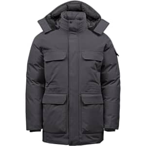 Men's Denali Parka in dark grey, featuring multiple pockets and a hood. The jacket has a logo on one sleeve.