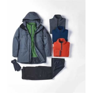 A grey jacket with a hood, paired with a green fleece, blue and orange jumpers, and black pants, plus gloves.