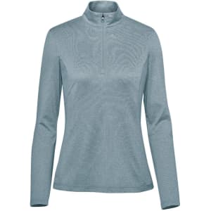 A light blue women's pullover with a 1/4 zip and long sleeves. It has a logo on the chest.