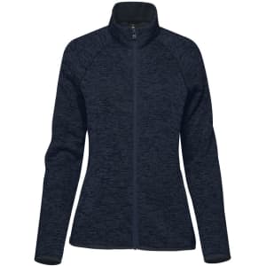 A navy blue women's fleece jacket featuring a full zip and high collar. It has a logo on the front.