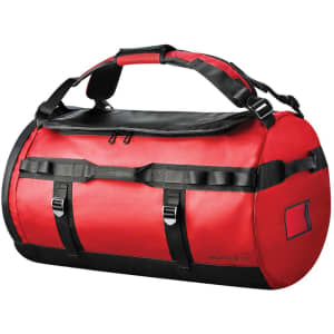 A red waterproof duffle bag with black accents and straps, featuring a logo and sturdy carry handles.