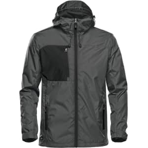 A grey rain jacket with a black panel and a hood, featuring zippered pockets and a brand logo.