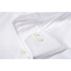 A white button-up shirt featuring a classic collar and pearl buttons on the cuffs. It has a branding logo.