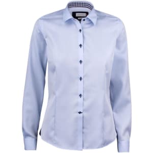 A light blue button-up women's shirt with dark buttons and a checked pattern inside the collar. It features a logo.