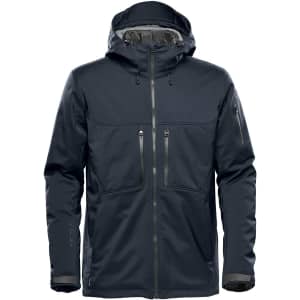 A dark grey jacket with a hood, featuring multiple zip pockets and a modern design. It has a logo on one sleeve.