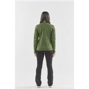 A green performance jacket viewed from the back, paired with black pants. The jacket features a logo.