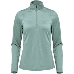 A women's 1/4 zip pullover in a soft green colour, featuring long sleeves and a high collar. It has a logo.