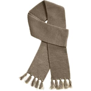 A Ruga Knit Scarf in a muted olive green shade, featuring textured ribbing and fringe details.