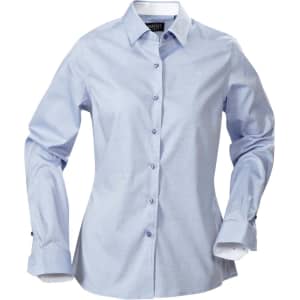 A light blue button-up women's blouse with a collar and button details, featuring long sleeves and a logo.