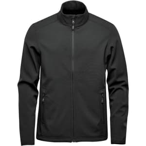 A black softshell jacket with a high collar and zippered pockets, featuring a logo on the chest.