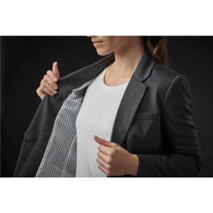 A women's grey Delano knit blazer with a striped lining, held open to display its interior.