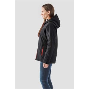 A black softshell jacket with a hood and red accents, displayed on a model from the side.