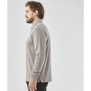 A grey long-sleeved micro pique polo shirt displayed on a male model in profile view. Features a logo.