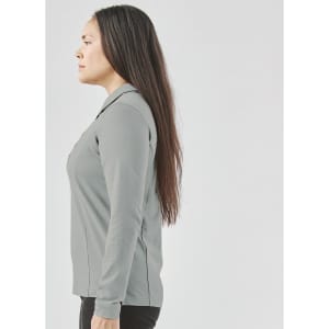 A women's long-sleeve micro pique polo in grey, featuring a collar and a fitted design.