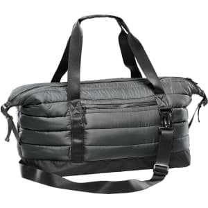 A quilted duffle bag in dark green, featuring adjustable straps and a zippered pocket. It has a logo on it.
