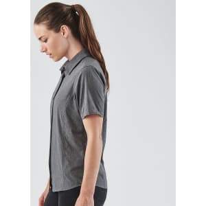 A women's button-up shirt in grey with a collared neckline and short sleeves, featuring a logo.