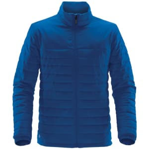 A blue quilted jacket with a zip front and stand collar, featuring a logo on the side.