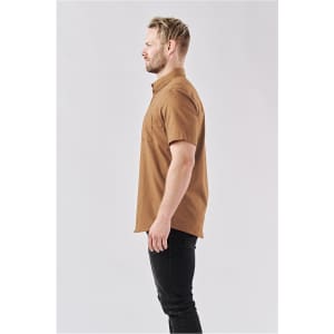 A side view of a men's short-sleeve button-up shirt in brown with a subtle pattern, featuring a small pocket.