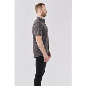 A men's button-up shirt in dark grey, featuring short sleeves and a standard collar, with a subtle logo.