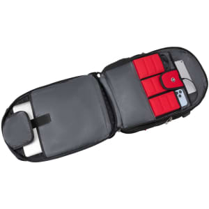 A grey backpack with red interior compartments, featuring space for devices and a logo.