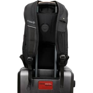 A black Swissdigital Terabyte Backpack is displayed, featuring padded straps and a built-in handle for easy transport.