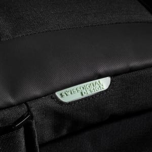 A close-up of a black Swissdigital Arosa Shoulder Bag featuring textured fabric and a logo on the front.