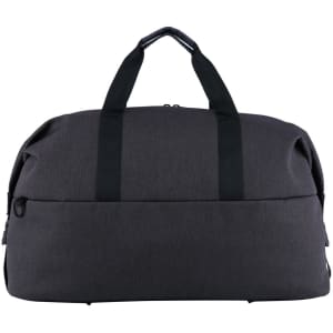 A grey duffle bag with black handles and a zip closure, featuring a logo on the side.