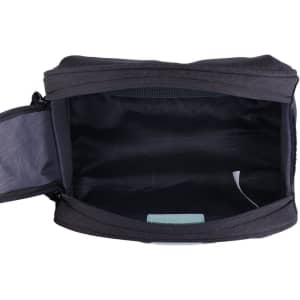 A black wash bag with a zippered closure and a mesh pocket inside, featuring a logo.