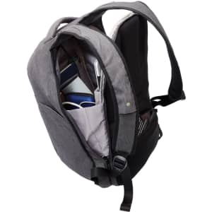 A grey anti-theft backpack with multiple compartments, showcasing organisation for various items inside.