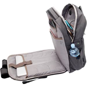 A grey laptop backpack with multiple compartments, a drink bottle, and a padded section for a laptop.