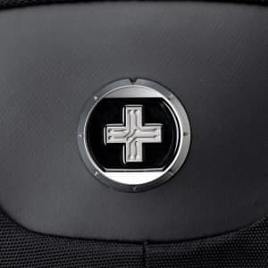 A black laptop backpack featuring a round metallic logo, designed for convenience and functionality.