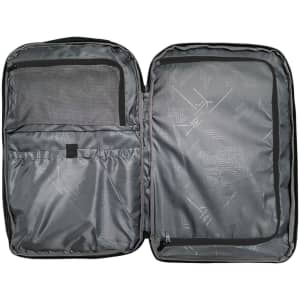 A grey backpack opened to display its interior compartments and pockets. It features a logo on the exterior.