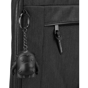 A black laptop sleeve featuring a zipper pocket and a keychain accessory with a cute monster design.