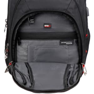 A black backpack interior featuring multiple compartments, including a zippered section and RFID protection.