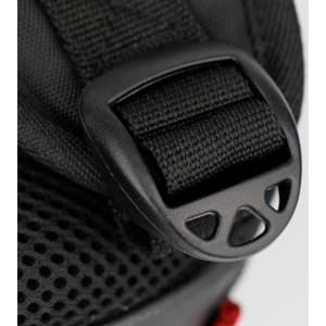 A close-up of a black strap buckle from the Swissdigital Pixel Backpack, featuring textured fabric and a mesh design.