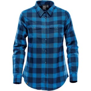 A blue plaid women's button-up shirt featuring a snap front, long sleeves, and two chest pockets.