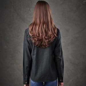 A women's long-sleeve button-up shirt in dark grey, featuring a relaxed fit and a back view with flowing hair.