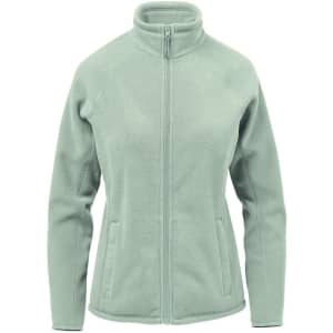 A women's polar fleece jacket in light green, featuring a zip front and side pockets, with a logo present.