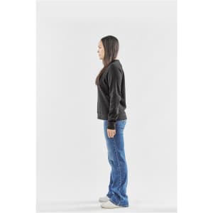 A model wearing a black Women's Monashee Fleece Crew Neck jumper in profile against a white background.