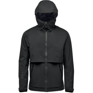 A dark grey technical shell jacket with a hood, featuring a zip closure and a cropped design. Branding is visible.