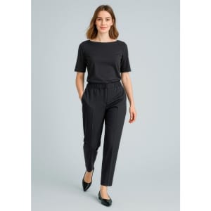A pair of black stretch waist pants paired with a matching black top, featuring a relaxed fit and pockets.