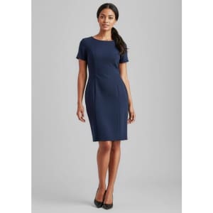 A fitted navy short sleeve shift dress on a model, featuring a classic round neckline and a sleek design.
