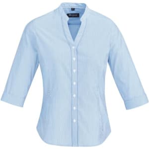A button-up women's shirt in light blue with 3/4 sleeves and a collared neckline. It features a logo.