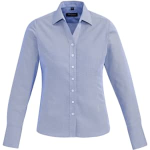 A long sleeve women's button-up shirt in light blue with a collar and a front button closure. Features a logo.