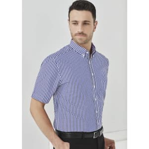 A short-sleeve blue and white checked button-up shirt with a collar, featuring a logo.