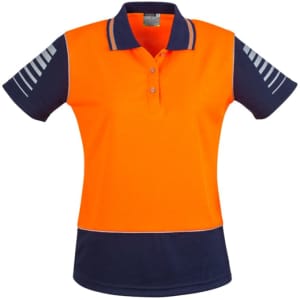 A women's short sleeve polo in bright orange and navy, featuring a logo and reflective stripes on the sleeves.