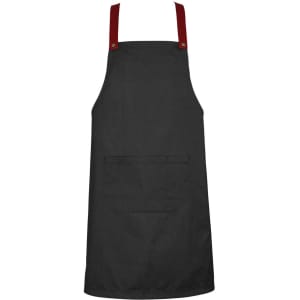 A black apron with red straps and a front pocket, featuring a branding logo.