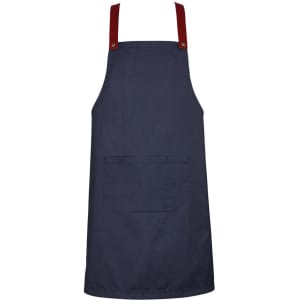A navy blue apron with red straps and a front pocket, featuring a small logo on the side.
