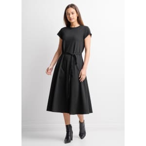 A black midi dress with a fitted top and flared skirt, featuring short sleeves and a waist tie.