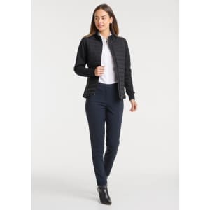 A women's tailor jacket in black, paired with a white shirt and navy trousers, featuring a sleek, contemporary design.